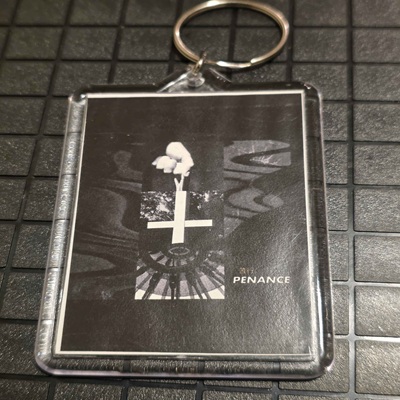 Penance side of the serialized NFC keychain